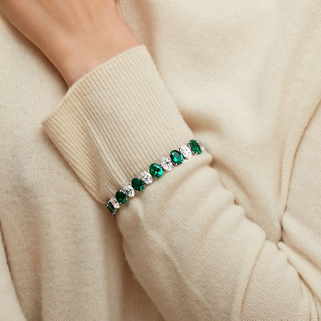 Oval Diamond and Round Brilliant Emerald Bracelet