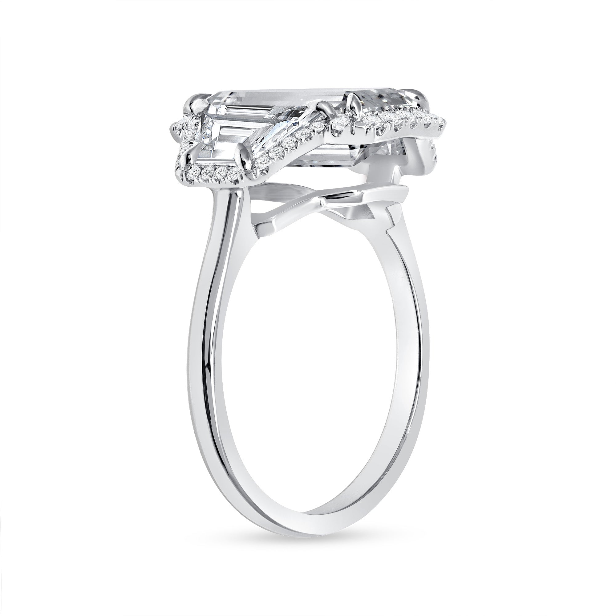 Emerald Cut Diamond and Two Trapezoid Diamonds Halo Ring