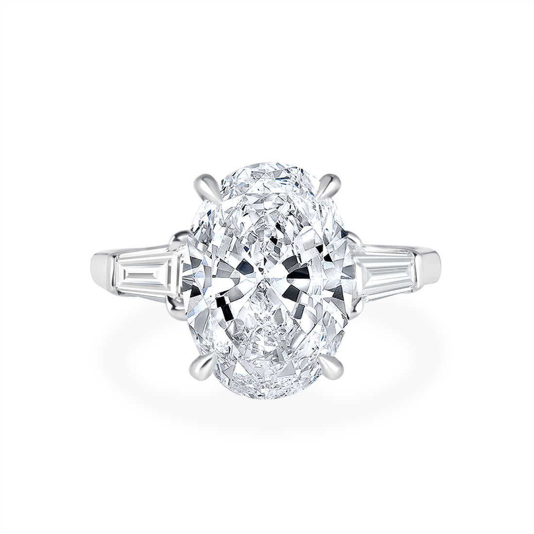 Oval Cut Diamond and Baguette Diamond Side Stone Ring