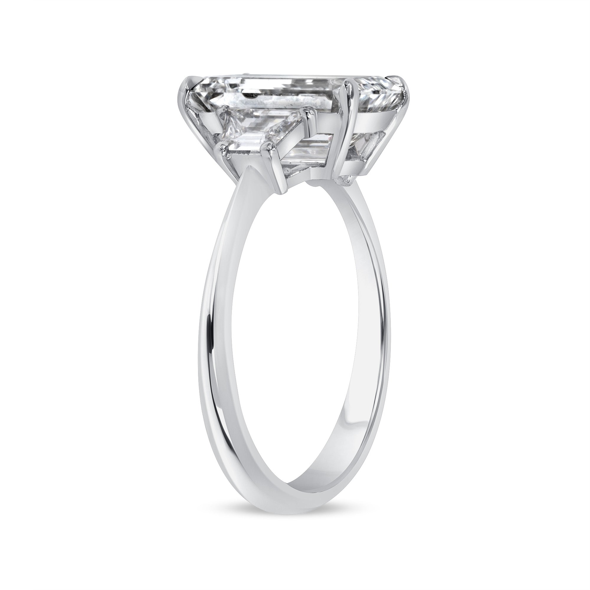 Emerald Cut Diamond and Two Trapezoid Side Stone Ring