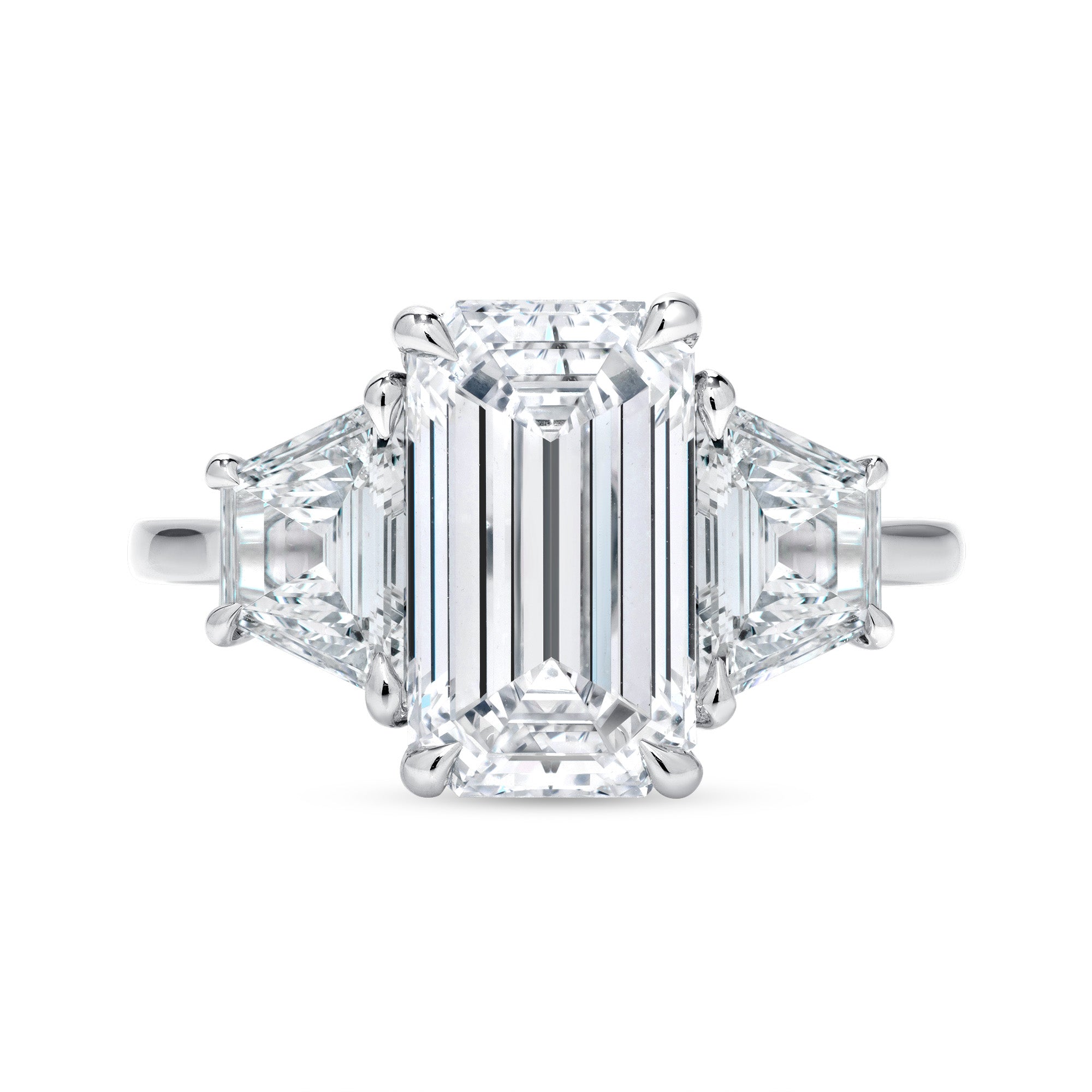 Emerald and Trapezoid Shape Diamond Three Stone Ring