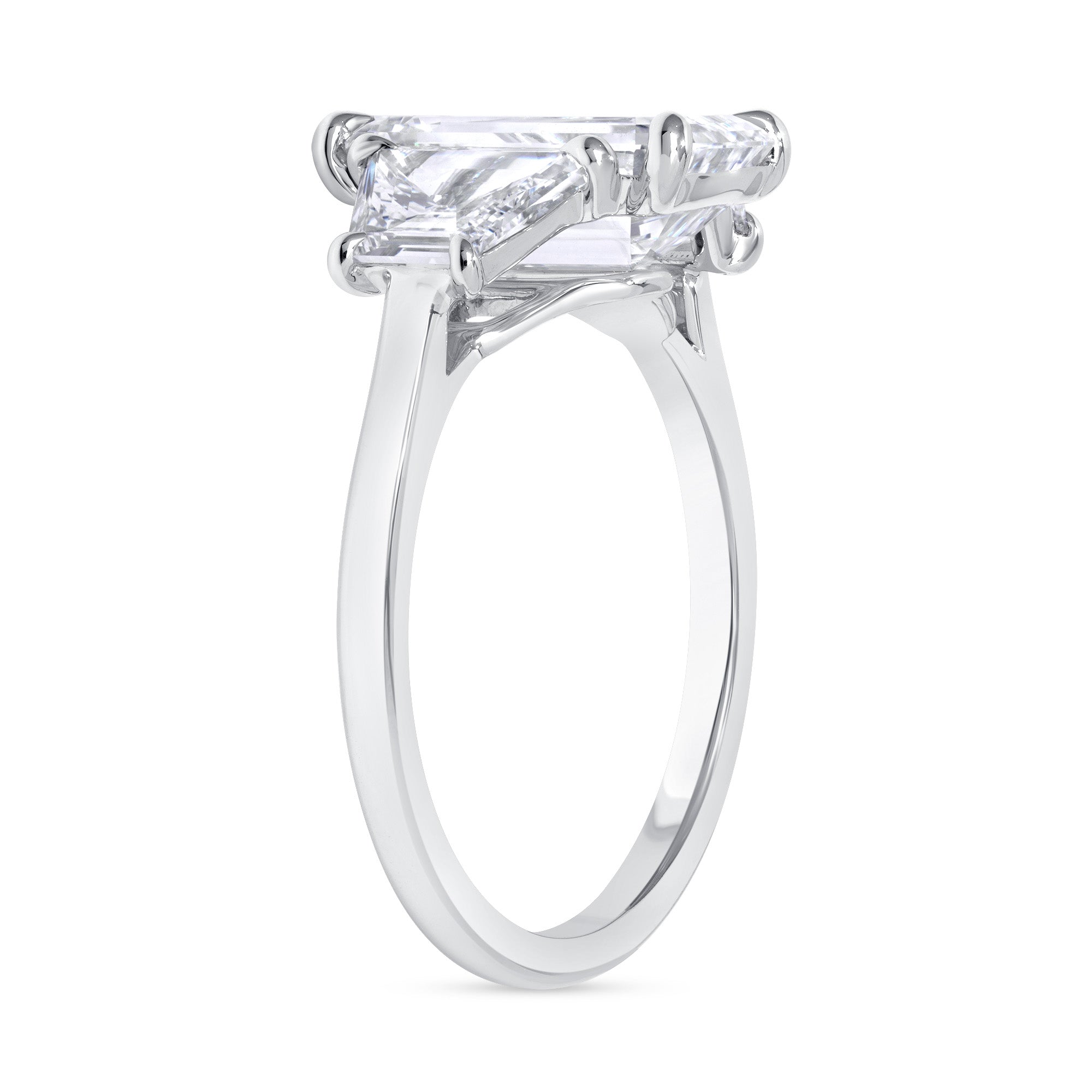 Emerald and Trapezoid Shape Diamond Three Stone Ring