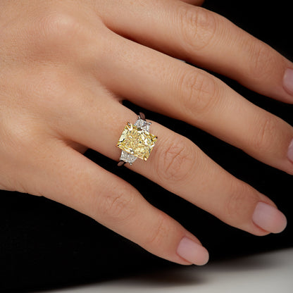 Radiant Cut Yellow Diamond and Trapezoid Diamond Three Stone Ring