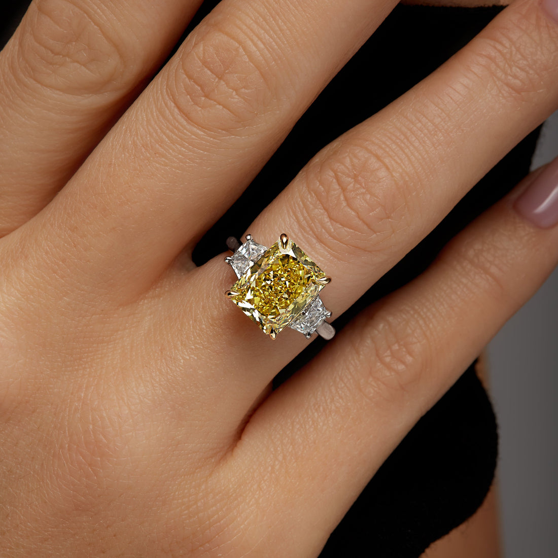 18K Yellow Gold and Platinum Fancy Yellow Radiant Cut Diamond and Trapezoid Diamond Side Stone Ring