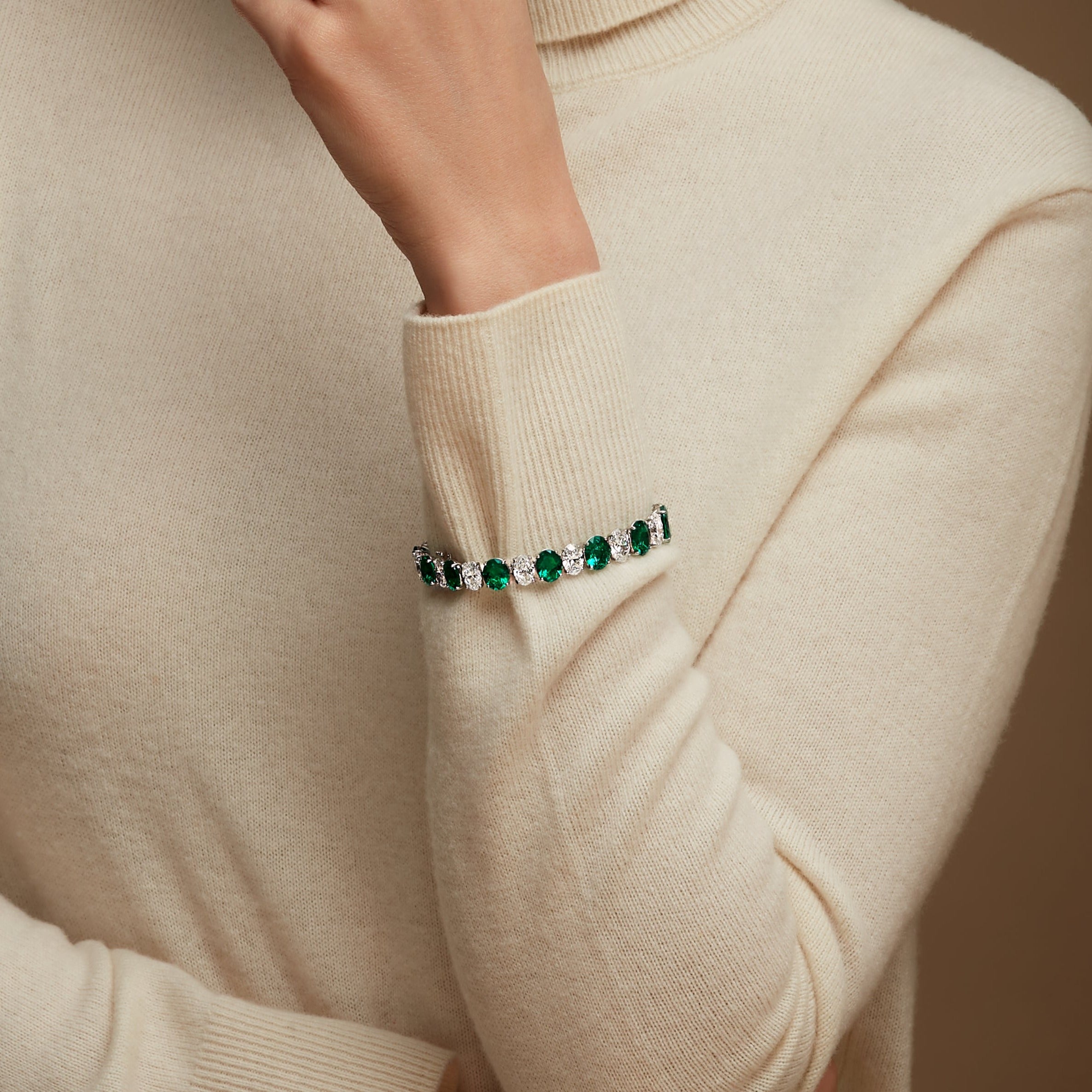 Oval Diamond and Round Brilliant Emerald Bracelet