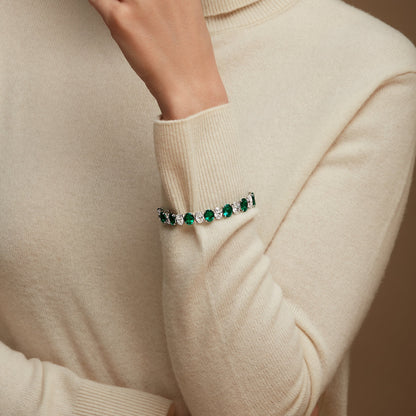 Oval Diamond and Round Brilliant Emerald Bracelet
