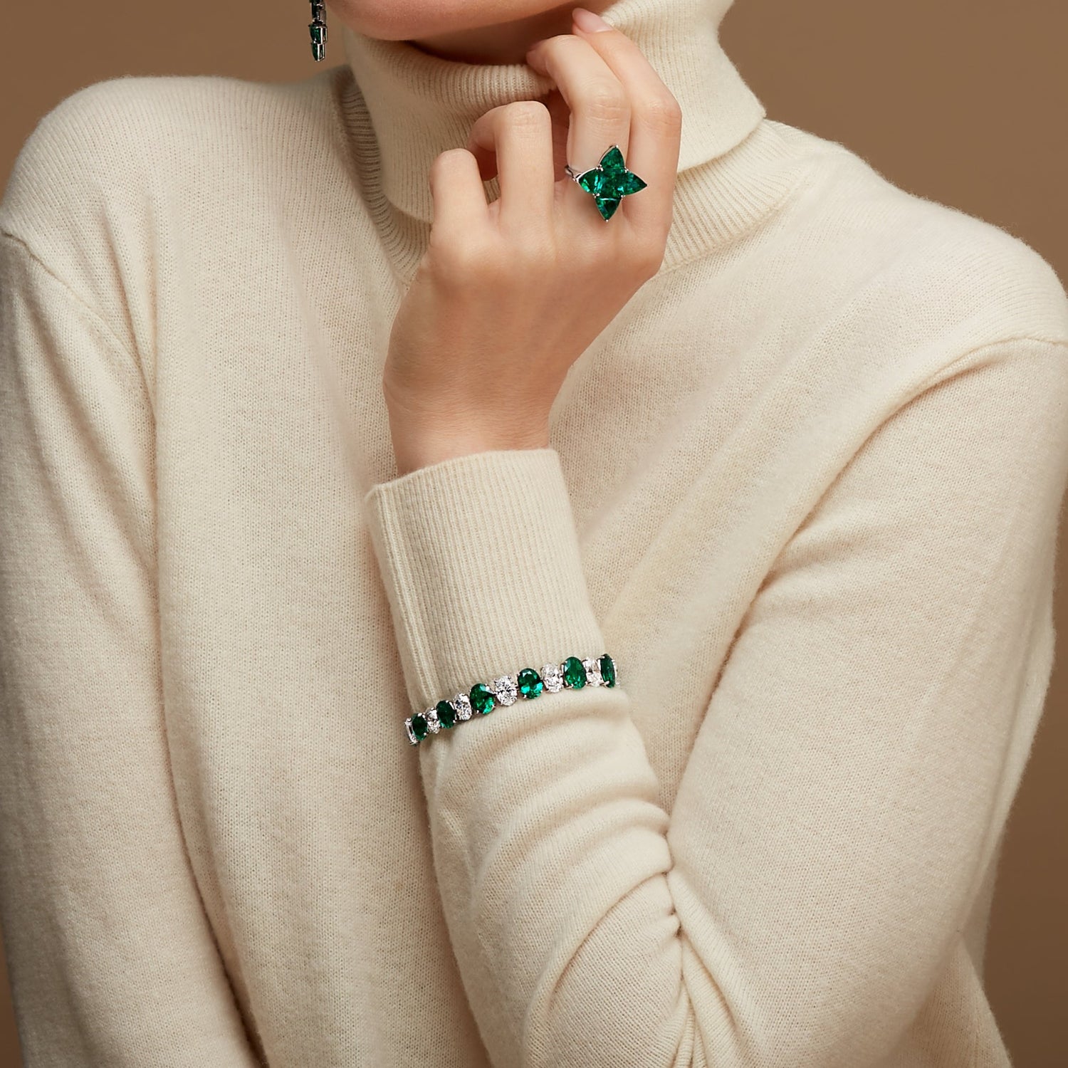 Oval Diamond and Round Brilliant Emerald Bracelet
