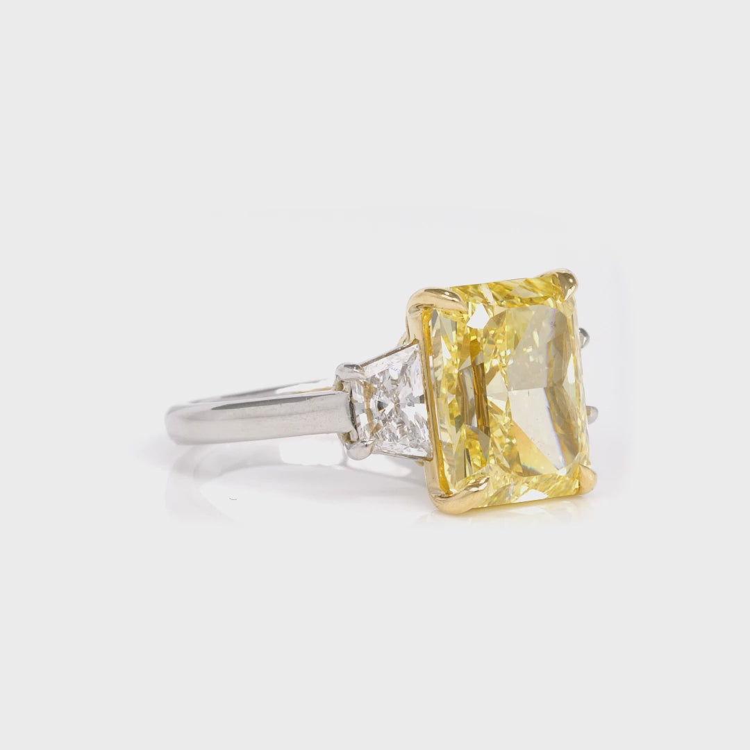 Radiant Cut Yellow Diamond and Trapezoid Diamond Three Stone Ring