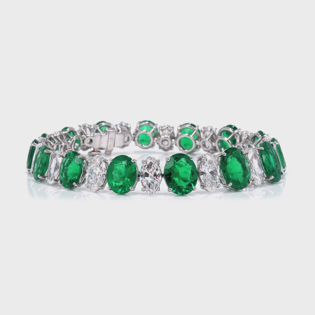 Oval Cut Colombian Emerald and Oval Cut Diamond Platinum Bracelet