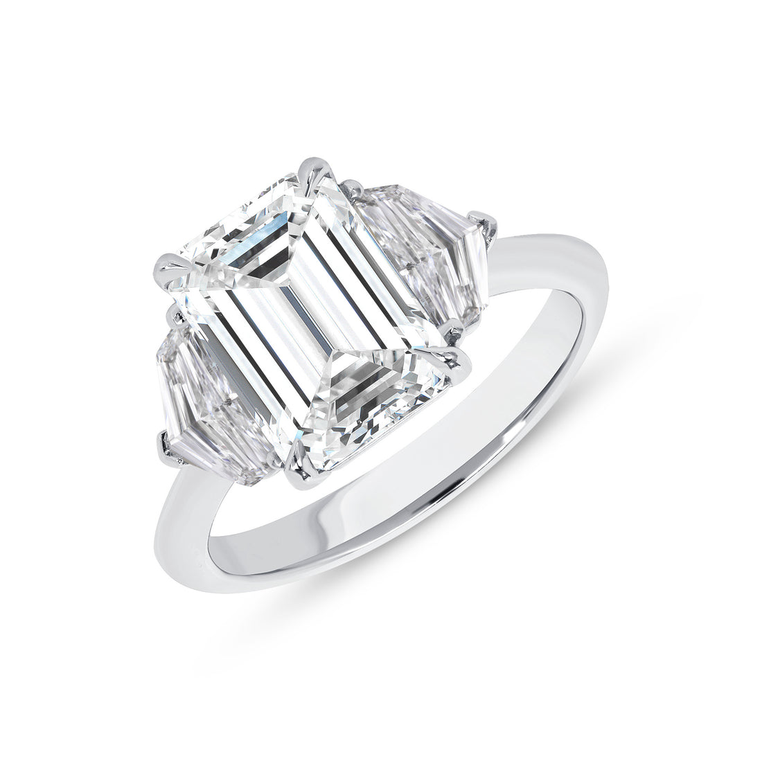 Platinum Three Stone Emerald Cut Diamond and Cadillac Diamond Side Stone Ring